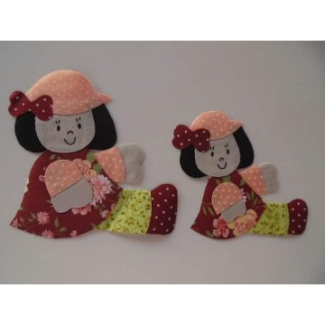 boneca sentada